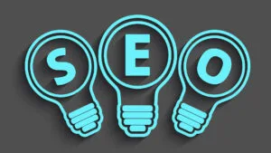 Blue lightbulbs forming the letters S, E, and O on a dark background, symbolizing SEO ideas.